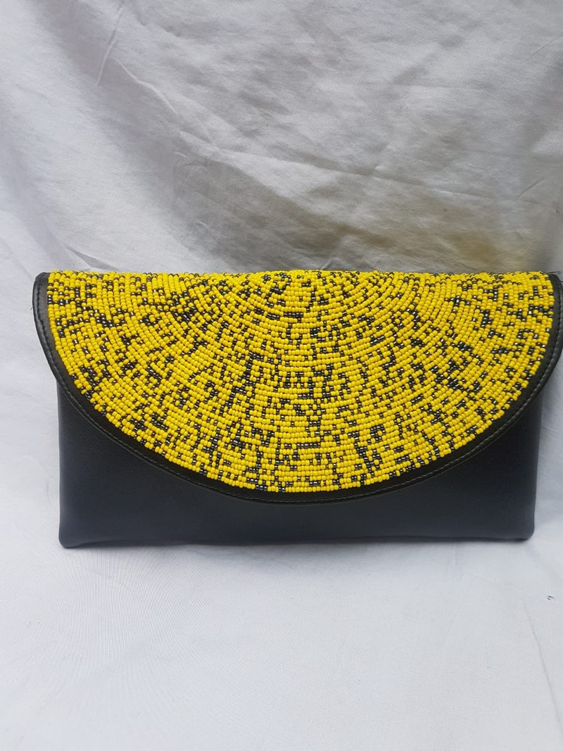 leather clutch purse with beaded decoration
