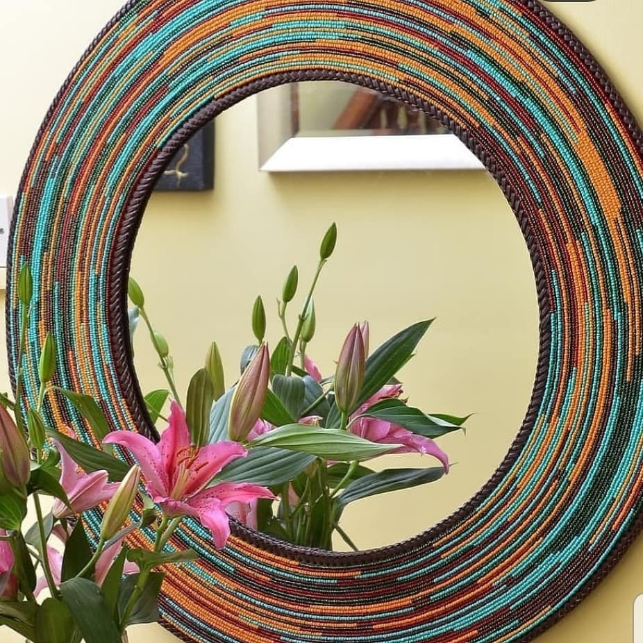 Circular mirror with Colorfully beaded me.