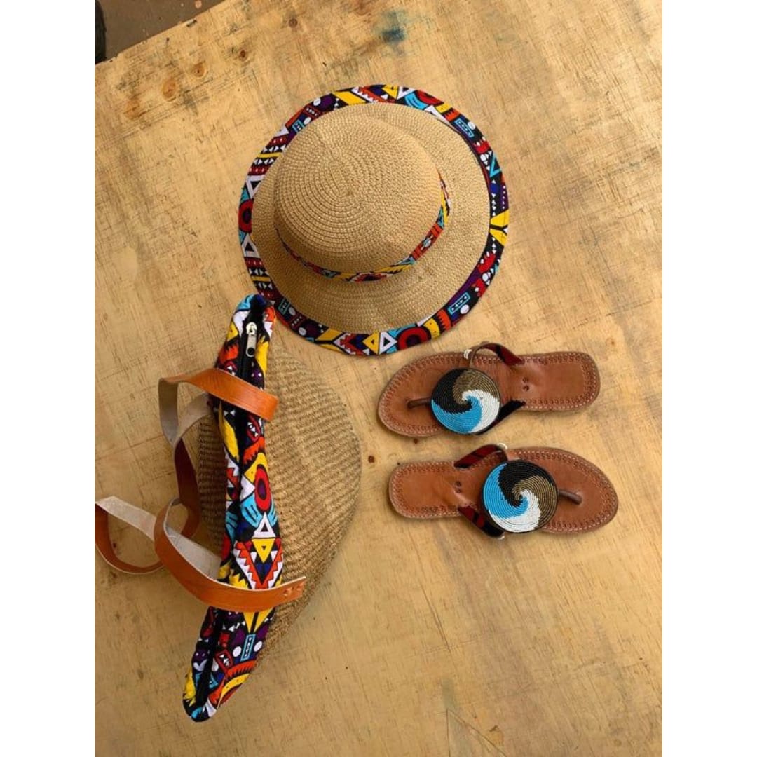 A set of woven bag, sandals and matching hat