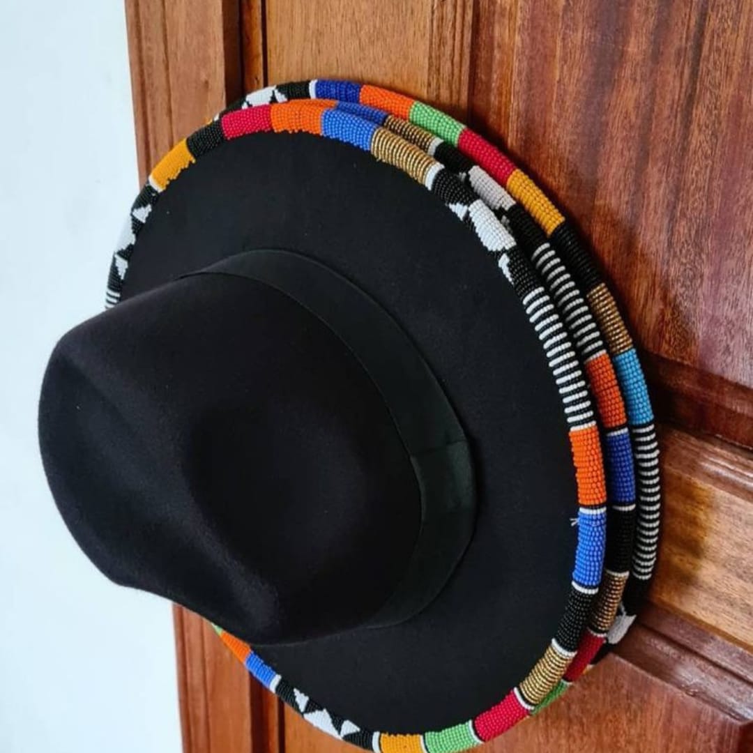 3 black Fedora hats with beaded decorations